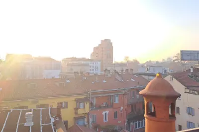 The view over the Milan rooftops from the bathroom